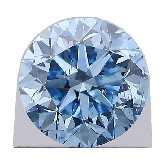 0.69 ct round lab-grown diamond, fancy vivid blue, SI2 clarity, IGI certified, still from its 360° video